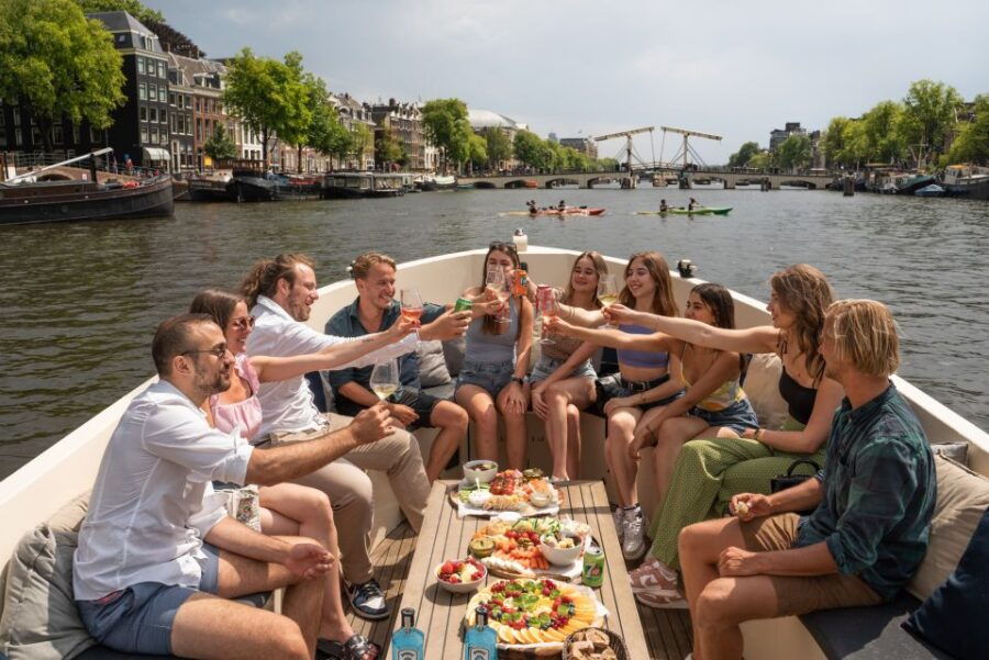 Amsterdam: German Guided Open Boat Cruise With Bar Onboard - Good To Know