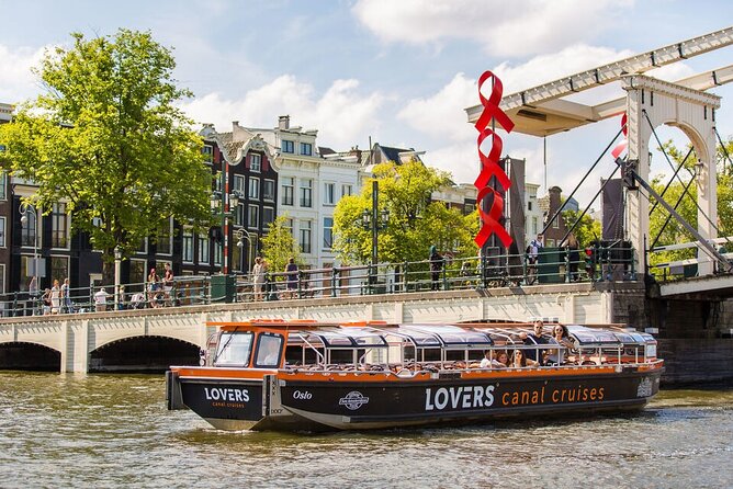 Amsterdam 1-Hour Sightseeing Canal Cruise by Semi-Open Boat - Overview of Amsterdam Canal Cruise