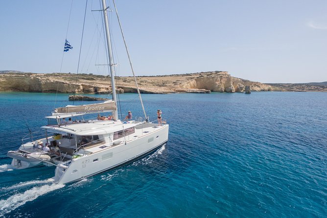 Catamaran Full-Day Cruise Around Naxos or Paros With Lunch - Trip Confirmation and Accessibility