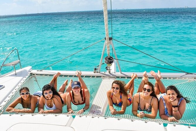 Catamaran to Isla Mujeres Only for Adults - Buffet & DJ at the Beach Club - Selecting Date and Travelers
