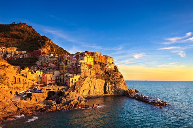 Cinque Terre Sunset Boat Tour on a Traditional Wooden Gozzo - Traveler Experience