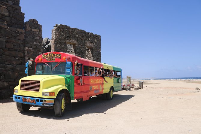 Colorful Beach Bus Sightseeing Tour of Aruba - Tour Overview and Highlights