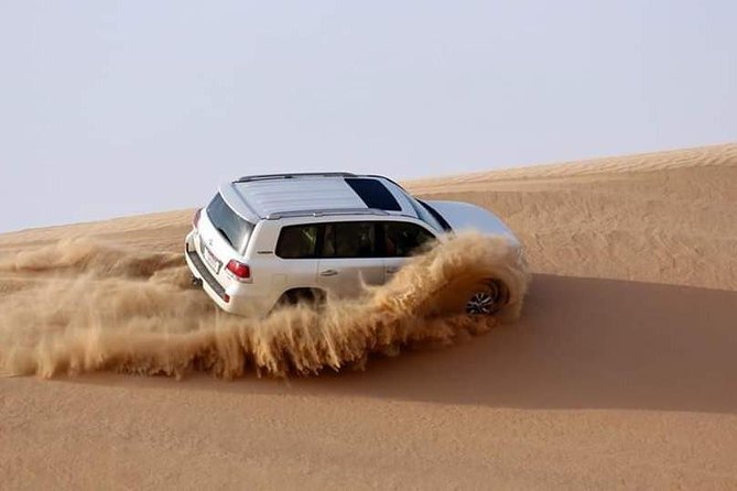 Dubai Desert Safari With Live Shows, Sand Skiing & Boarding, BBQ - Cancellation Policy