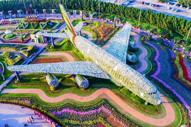 Dubai Miracle Garden and Global Village Shopping Tour - Pricing and Booking Details