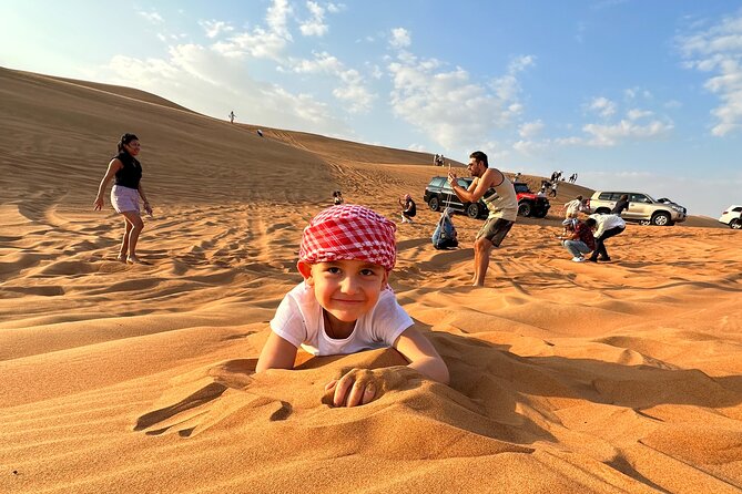 Dubai: Red Dunes, Sandsurf, Camel Ride, BBQ Dinner at Desert Camp - Exciting Activities in the Dubai Desert