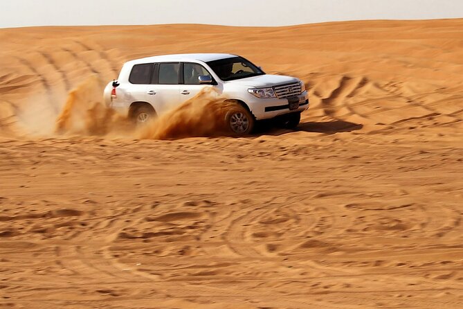Dune Bashing and Camel Riding Experience in Dubai With Dinner - The Thrilling Desert Adventure