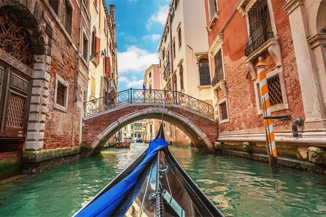 Explore the Canals on an Authentic Gondola Tour Venetian Dreams - Tour Highlights