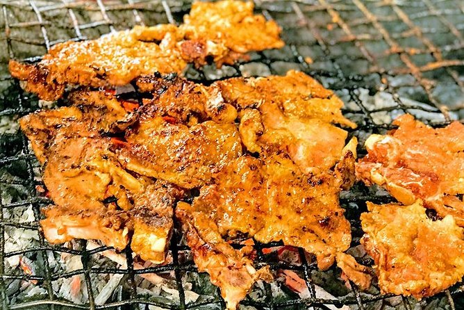 Food Tasting, Sightseeing Night, Charming Show & Rooftop Bar Tour From Hoi an - Tour Details and Conditions