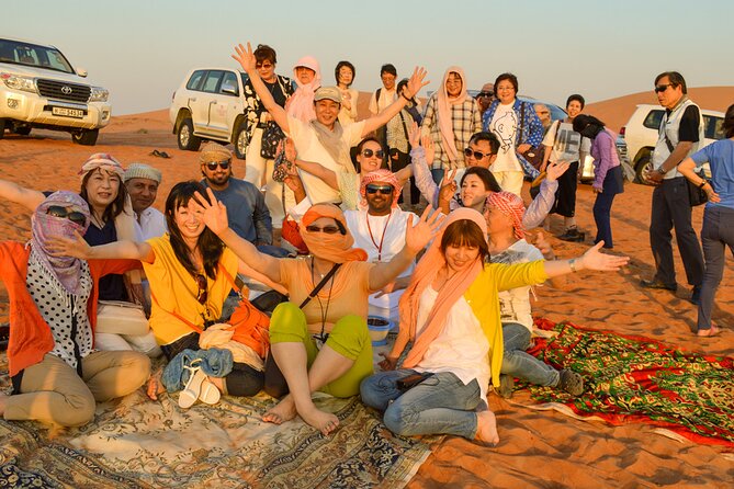 Full-Day Guided Red Dunes Desert Tour in Dubai With Camel Ride - Tour Highlights