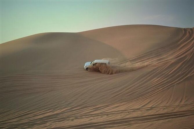 Gold Sunset Desert Safari ,Sand Boarding,Camel Ride,Inland Sea - Adventure Tour in 4WD Vehicle
