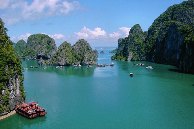 Halong Bay Discovery With 8 Hours Boat Tour From Halong City - Overview of Halong Bay Discovery Tour