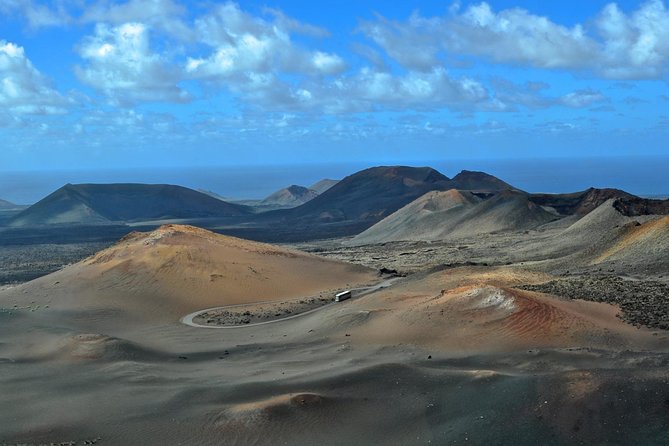 Lanzarote Bus Tour With Camel Ride and Wine Tasting - Tour Overview and Itinerary