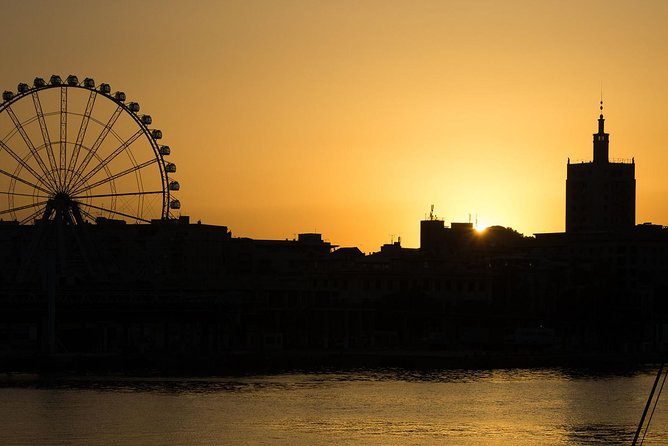 Malaga Sunset Cruise and Restaurant Dinner - Overview of the Experience