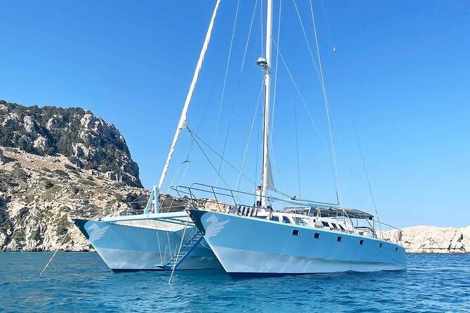 Private Catamaran Day Sailtrip From Rhodes to Tsampika Beach via Anthony Quinn - Trip Overview