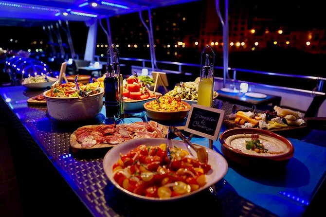 Romantic Dhow Creek Dinner Cruise With Live Shows and International Buffet - Pricing and Booking Details