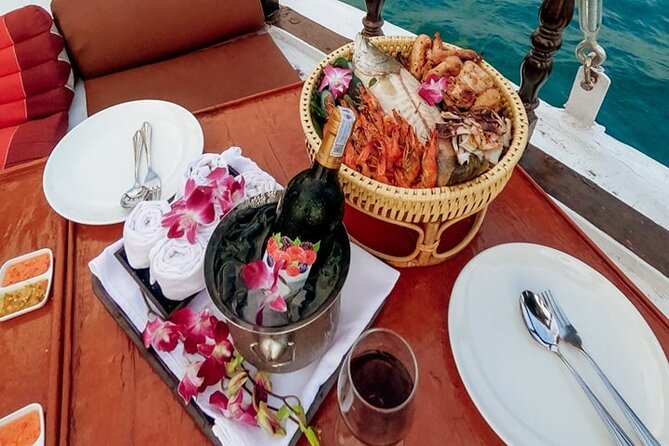Romantic Sunset and Seafood Dinner Cruise With Plankton Swimming - Overview and Highlights