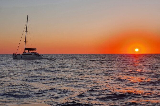 Santorini Classic Catamaran Cruise With Meal Drinks and Transfers - What to Expect on the Cruise