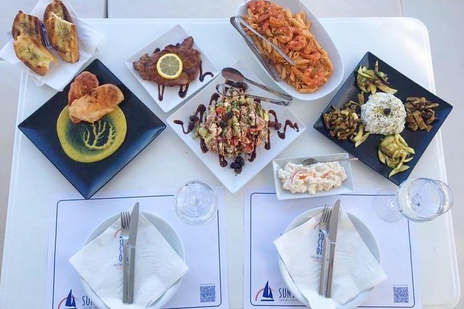 Santorini Luxury Catamaran Sunset Cruise With BBQ, Drink and Transfer - Swim and Snorkel at Red and White Beaches