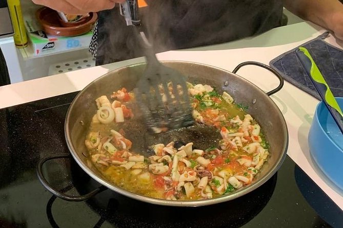 Small Group Cooking Class of Tapas and Paella in Madrid - Pricing and Booking Details