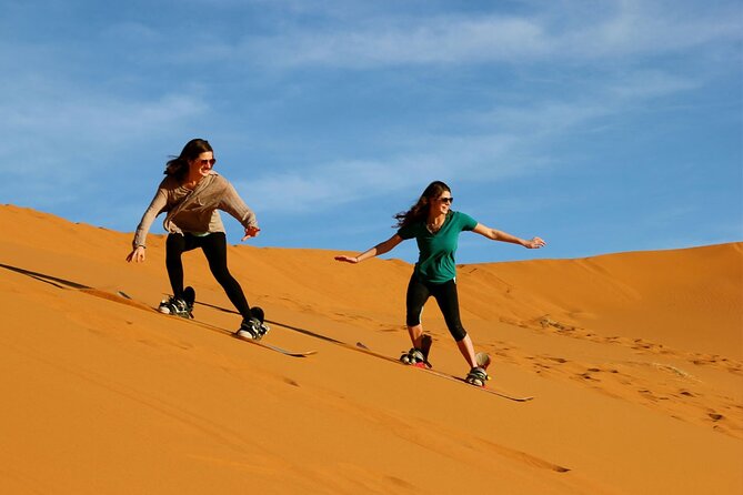 Sunset Camel Caravan Experience With Sunboard and BBQ Dinner Buffet - Tour Overview and Inclusions