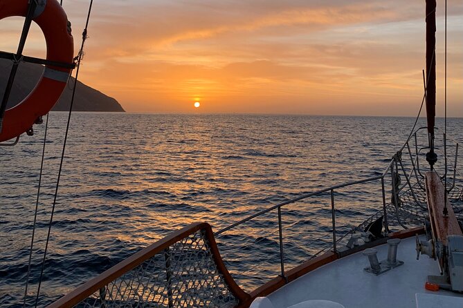 Sunset Cruise in Rhodes With Unlimited Drinks & Snacks - Booking Confirmation and Accessibility