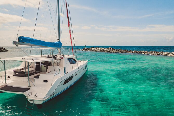 8-Hour Private 44 Leopard Catamaran Tour to Cozumel Beach W/Food & Open Bar - Meeting and Pickup