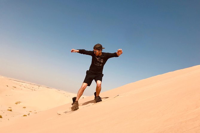 Abu Dhabi Morning Desert Safari,Dune Bashing,Sandboarding,Camel Riding&Quad Bike - Thrilling Activity: Dune Bashing