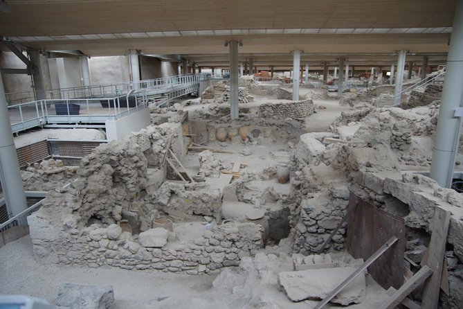 Archaeological Bus Tour to Akrotiri Excavations & Red Beach - Tour Guide and Activities