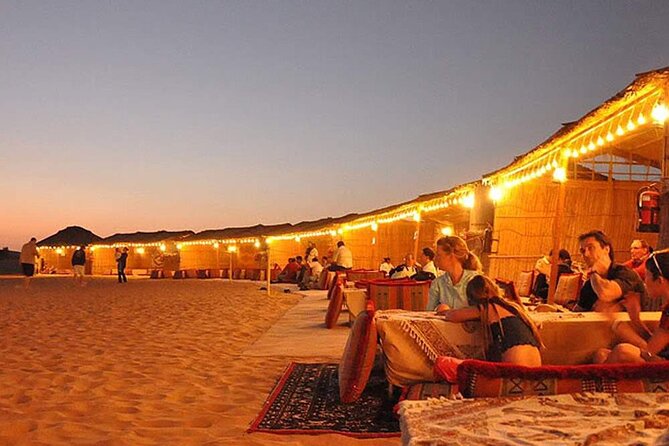 Dune Bashing and Camel Riding Experience in Dubai With Dinner - Quad Bike Ride With Breathtaking Views