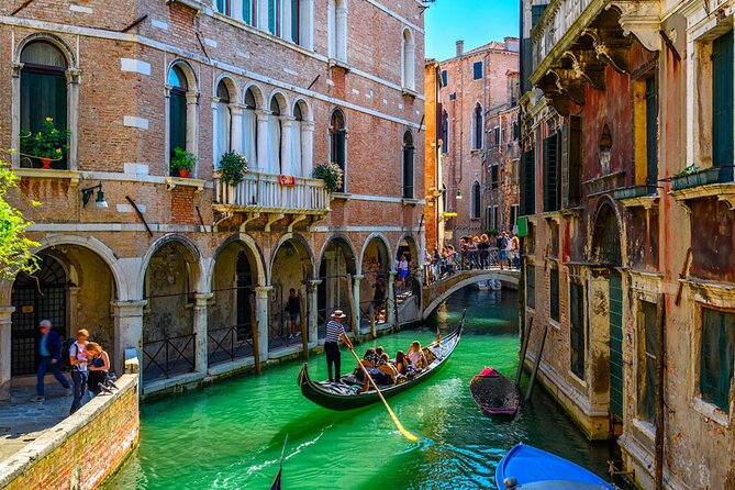 Explore the Canals on an Authentic Gondola Tour Venetian Dreams - Gondola Experience Details