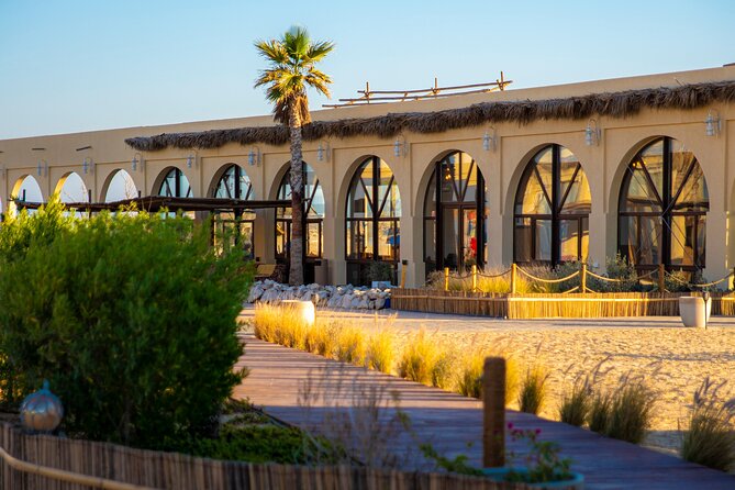 Full-Day Al Majles Beachfront Resort Pass With Lunch - Inclusions and Optional Activities