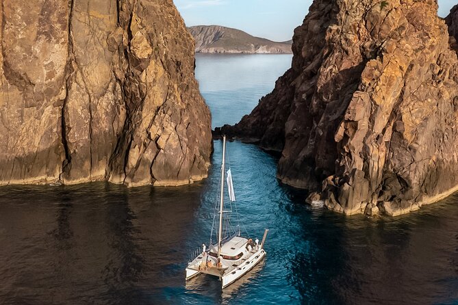 Full-Day Tour of Milos and Poliegos Small Group Catam With Lunch - Cancellation Policy and Weather Conditions
