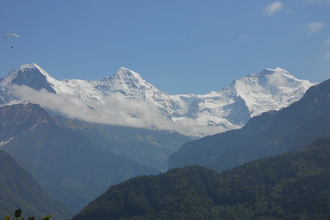 Interlaken Private Tour: Mountains Cows, Thun Lake, and Brienz Lake - Tour Overview