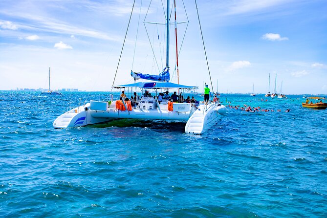 Isla Mujeres Tour on Catamaran With Snorkel, Open Bar, Buffet & Beach Club - Tour Inclusions