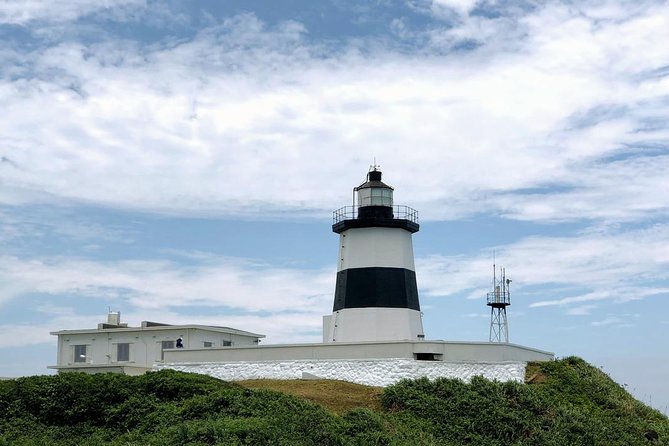 N107 Freshwater Red Mao City Fuguijiao Lighthouse Jinshan Old Street Keelung North Coast Day Tour (1 - Pickup and Drop-off