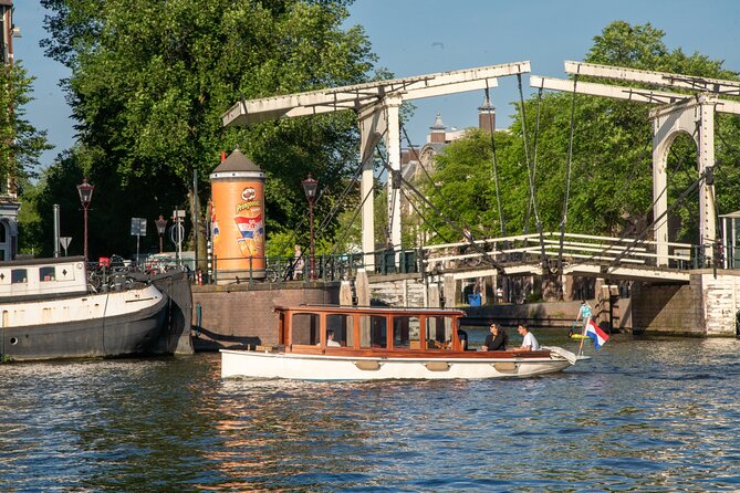 Private Boat Tour Amsterdam - 90 Min Incl. Welcome Drink on Historic Saloon Boat - Cancellation Policy