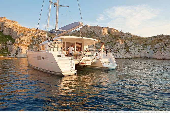 Private Morning Tour Lagoon 400-380 Sailing in Santorini ,Lunch, Drink, Transfer - Cancellation Policy