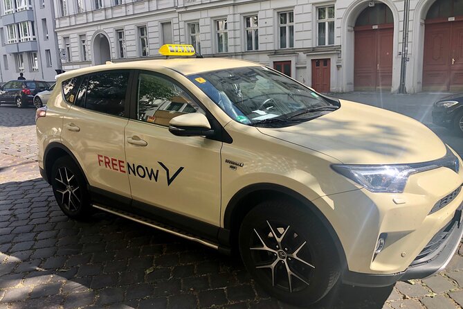 Private Taxi Tour Through City East History and Architecture 1-2h - Architectural Highlights