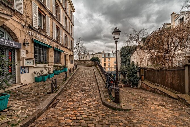 Private Transfer From Bayeux To Paris With a 2 Hour Stop in Caen - Transfer Details and Amenities
