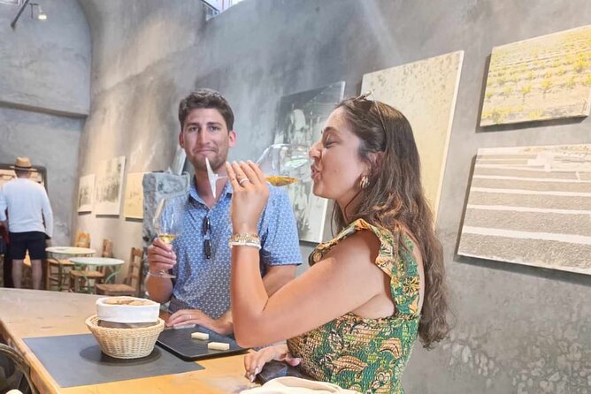 Private Wine Visit in Fira With 12 Wine Tastings and Tapas - Tapas Pairing With Wines