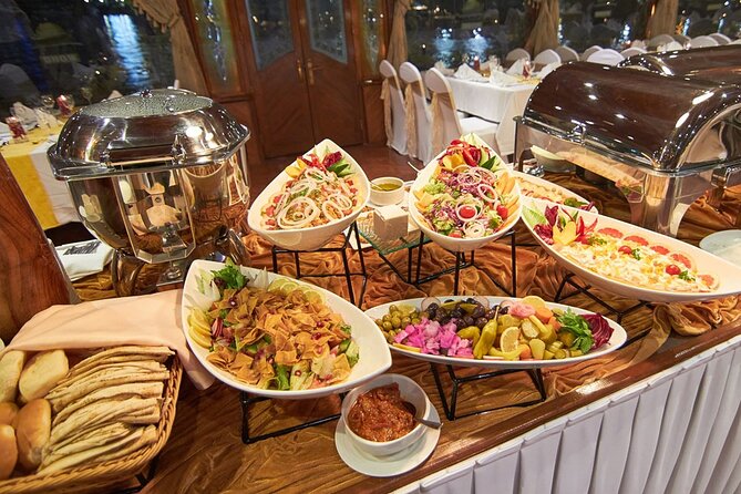 Romantic Dhow Creek Dinner Cruise With Live Shows and International Buffet - Tour Highlights