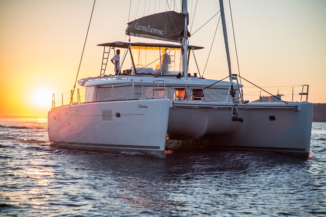 Santorini Caldera Gold Sunset Cruise With BBQ on Board and Open Bar - Booking and Traveler Options