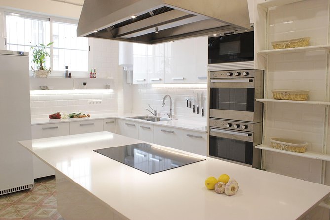 Small Group Cooking Class of Tapas and Paella in Madrid - Duration and Tickets