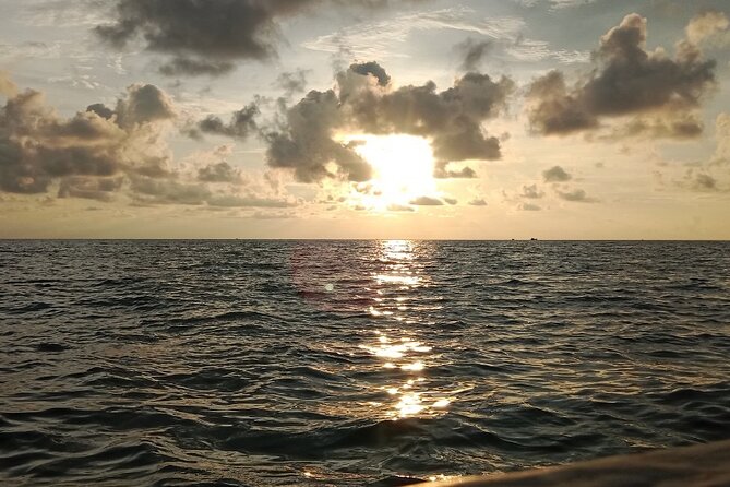 SUNSET Boat Trip-Seafood BBQ Dinner on Cruise-Night Squid Fishing - Overview of the Experience