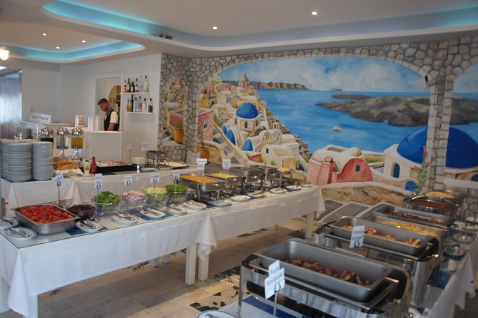 Traditional Greek Night Live Music & Dinner Show in Santorini - The Sum Up