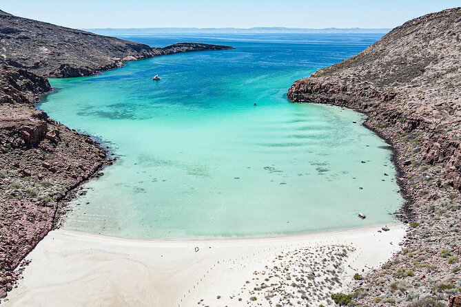 Adventure to Espiritu Santo Island: Snorkel With Sea Lions and Beach - Cancellation Policy and Traveler Photos