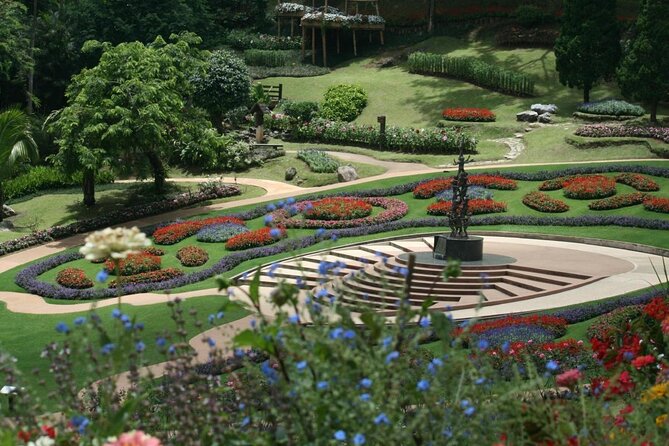 Chiang Rai Private Tour: Oup Kham Museum, White Temple & More - Botanical Gardens and Teakwood Houses