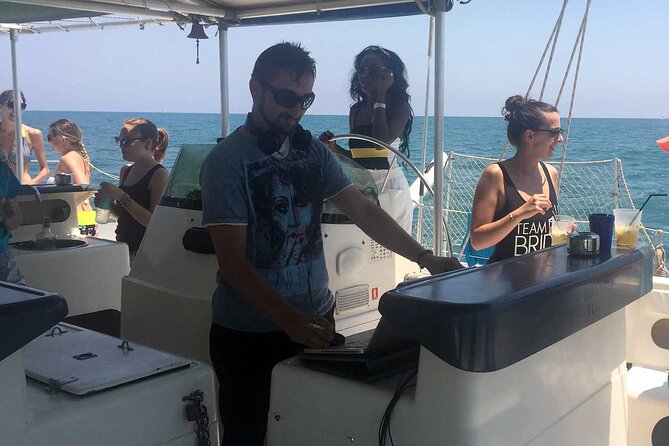 Day Cruise Party With Lunch & Seaside Cocktail in Valencia - Take a Refreshing Dip in the Mediterranean Sea