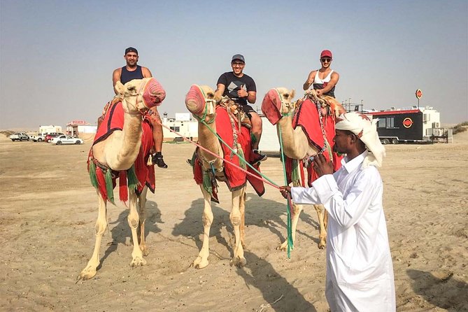 Doha Sunset Safari: Camel Trek With Dune Bashing and Sandboarding - Tour Details and Pricing