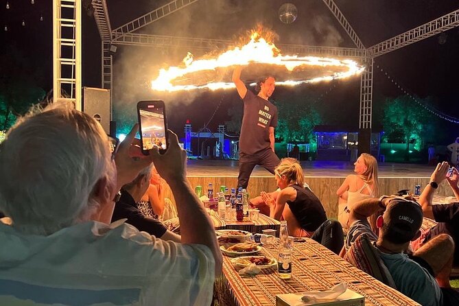 Dubai: Red Dunes, Sandsurf, Camel Ride, BBQ Dinner at Desert Camp - Vegetarian Options and Convenient Pick-up Service